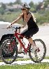 Sexy actress Lindsay Lohan pictures while biking around while on a break from rehab in Utah