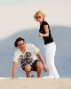 Model Jenny McCarthy pic with Jim Carrey watching the sun set in a romantic atmosphere