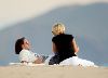 Model Jenny McCarthy pic with Jim Carrey watching the sun set in a romantic atmosphere