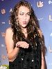 Miley Cyrus arrives at the Us Weekly Hot Hollywood Party at Opera on September 26, 2007 in Los Angeles, California