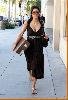 Kim Kardashian on the streets wearing a summer brown dress In Beverly Hills on February 28th 2008