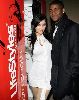 Kim Kardashian and Reggie bush in the LifeStyles Make-Out Booth in January 2008