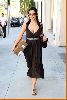 Kim Kardashian on the streets wearing a summer brown dress In Beverly Hills on February 28th 2008