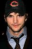 Ashton Kutcher wearing a cap