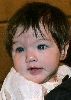 Suri Cruise : suri-cruise-smiling 275x383