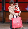 suri Cruise with her mom Katie shopping