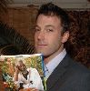 Ben Affleck reading a magazine