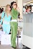 Anna Paquin and Kim Kardishian wearing a green jumpsuit shopping in August 2007