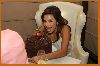 Eva Longoria and a large dark chocolate cake