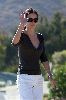 Courteney Cox large black shaded sunglasses