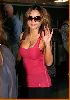 Tila Tequila picture at the airport wearing a pink sleevless top