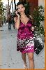 Kim Kardashian shows cleavage in purple dress while running errands in Beverly Hills on April 24th 2008