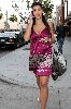 Kim Kardashian shows cleavage in purple dress while running errands in Beverly Hills on April 24th 2008