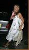 Jennifer Aniston in cleavagey dress arriving at La Famiglia restaurant