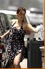 Tia Carrere : Tia Carrere shows some skin as she loads her shopping bags1 484fe73942edb