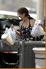 Tia Carrere : Tia Carrere shows some skin as she loads her shopping bags2 484fe73945601