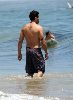 Jesse Metcalfe : Jesse Metcalfe swimming suit - showing his back neck Tattoo