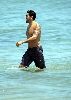 Jesse Metcalfe : Jesse Metcalfe swimming suit - showing a Tattoo on his arm