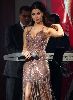 nancy ajram : fixing her dress in a concert