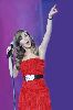 nancy ajram : nancy singing with the audience in a ared dress