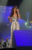 nancy ajram : nancy singing at stage in a concert