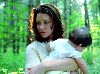 Evangeline Lilly : photo of evi with a baby from the upcoming movie afterwards - November 2008