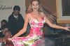 Dana Halabi : dancing in her concert wearing a floral dress