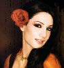 Diana Haddad : poster with a rose in her hair - old hair style