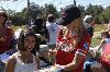 Christy Brinkley : signing an autogragh to a fan at the Artists and Writers annual Softball game