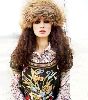 Olga Kurylenko : wearing a light brown fur hat