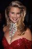 Christy Brinkley : poster of Christie wearing diamond necklace and red dress