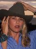 Christy Brinkley poster wearing a cowboy hat