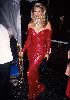 Christy Brinkley : Christie Brinkley wearing a glitering red dress with a huge diamond necklace