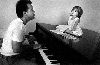 Alexa Ray Joel : a very old picture of billy joel singing to Alexa on the piano