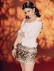 Haifa Wehbe : mini skirt and a white plain top