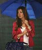 Nancy Ajram : holding an umbrella on the set of betfakkar fe aih video clip