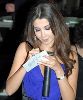 Nancy Ajram : Signing an autograph for a fan of her