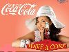 Nancy Ajram : nancy white hat in the coco cola printed ad poster