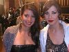 Nancy Ajram : nancy ajram with a fan at the entrance of a hotel getting ready to perfoem her best songs