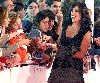 Nadine Labaki : Nadine on the red carpet signing autographs to her fans