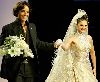 Hanan Turk : Hani El-Beheiri and actress Hanan Tork in one of his bridal designs before the Hijab