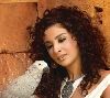 Hanan Turk : hanan turk curly hair picture with a parrot