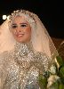 Hanan Turk : at a fashion party wearing an islamic wedding dress with Hijab