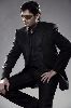 Ragheb Alama : black suit and sunglasses