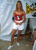 Jill Goodacre : wallpaper of Jill wearing a red top and a white denim shorts