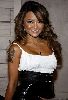 Tila Tequila : Tila wearing a white top and a black leather skirt