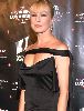 Traci Lords : on the red carpet in a black cocktail dress