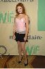 Renee Olstead : renee in a black fluffy mini skirt and simple silk light pink top