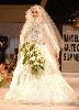 Hanan Turk : Hanan at a fashion show wearing a wedding bridal dress with a scarf