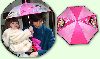 Suri Cruise : Suri is in love with her new pink dora umbrella